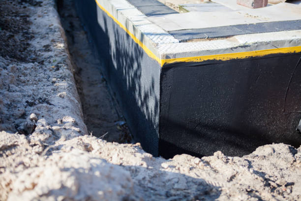 Professional Waterproofing technician working in Potwin, KS